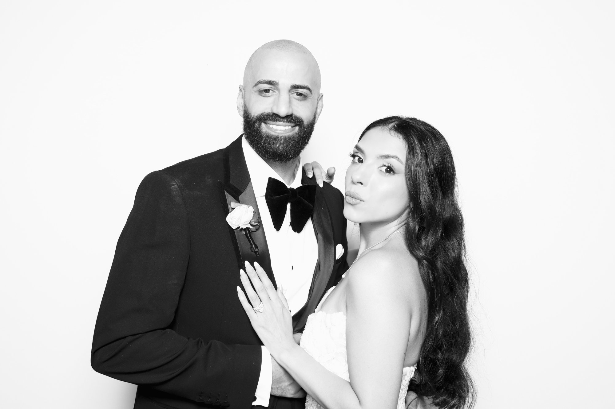 Black and white shot of two people posing